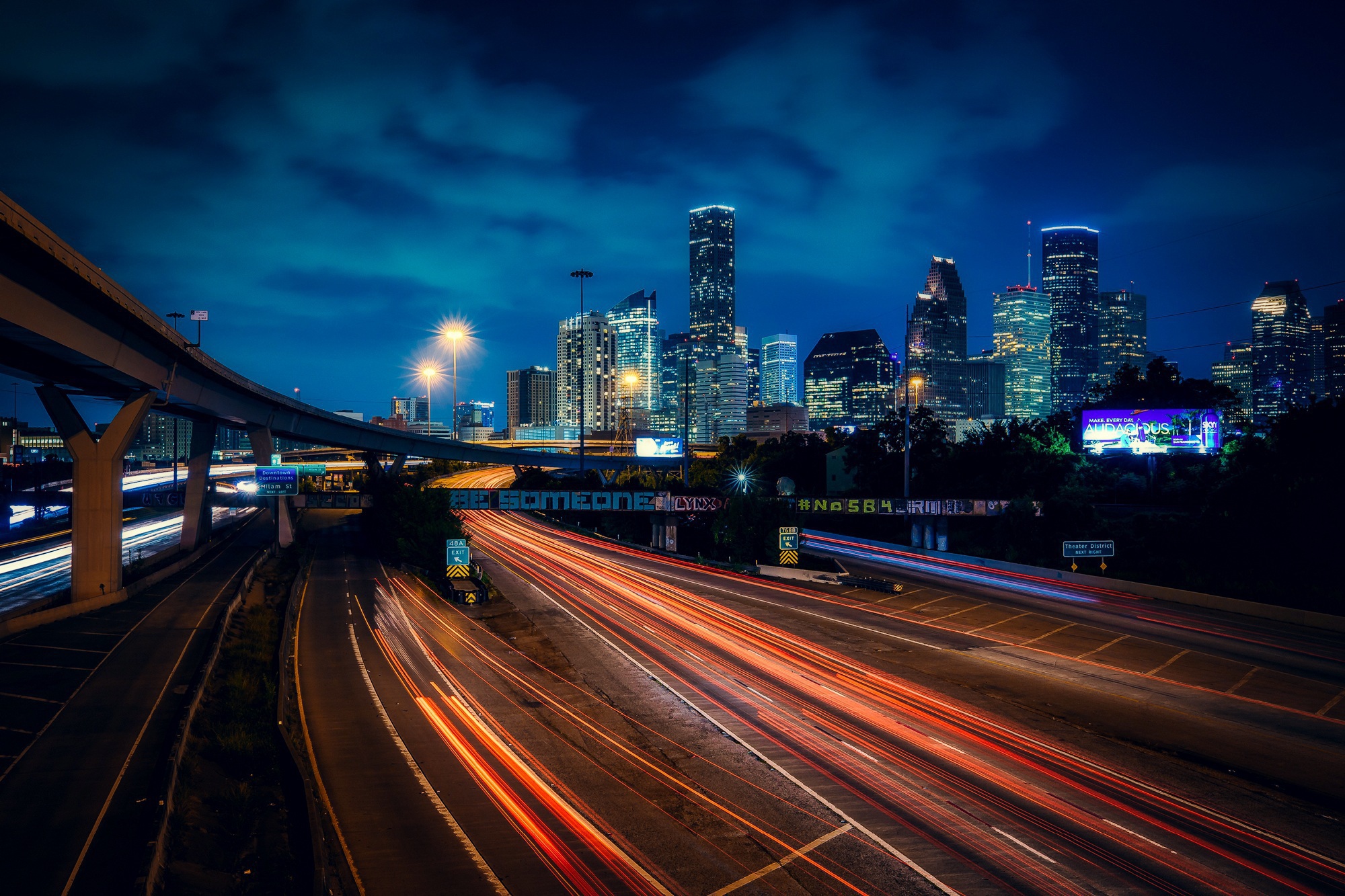 Texas city night freeway photo with graffiti